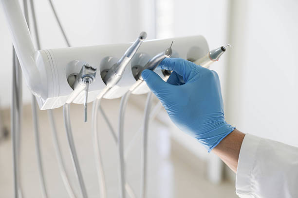 Professional Dental technician working in Central Square, NY